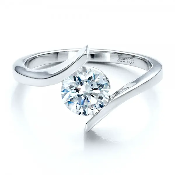 http://www.jordanjewellery.com/all-about-tension-set-engagement-rings/
