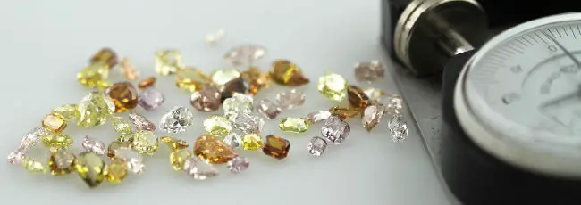 calibrating-mixed-parcel-of-colored-diamonds